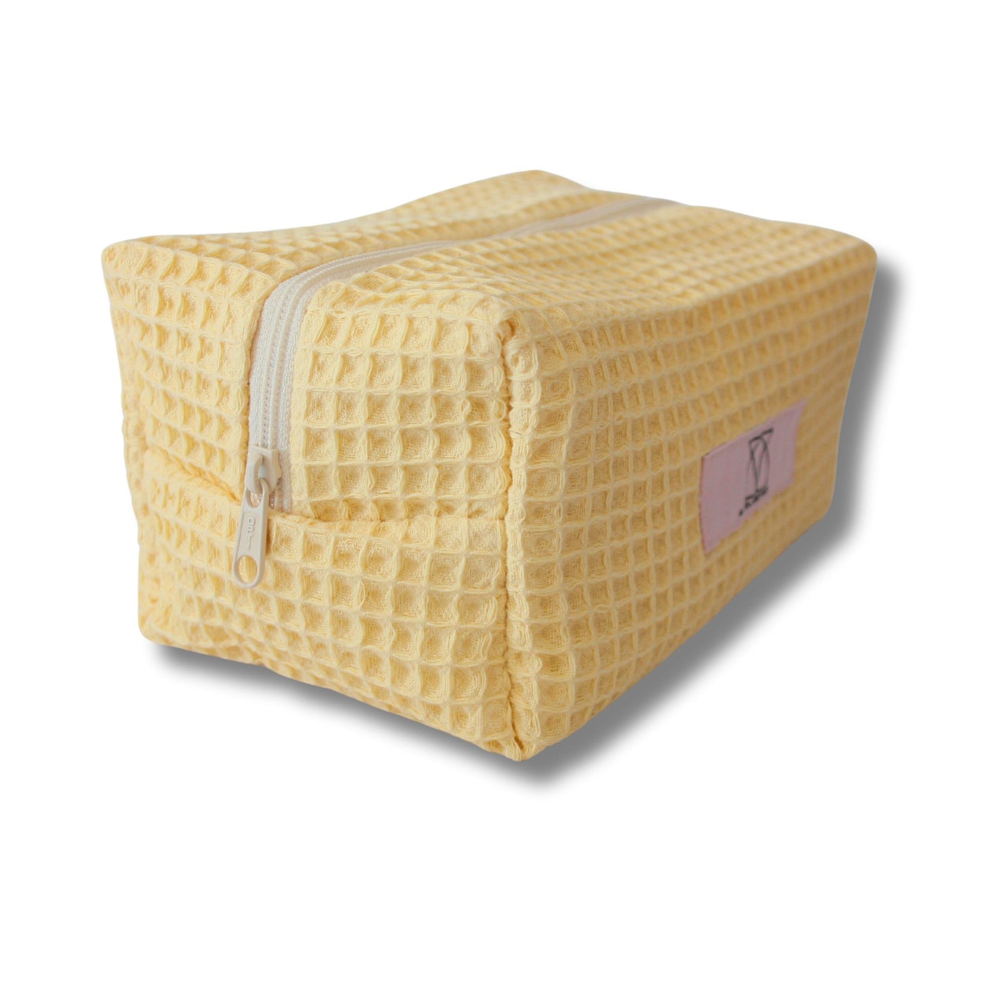 Beautybag/Kosmetiktasche in Buttergelb in warmem Buttergelb aus Waffelpique-Stoff, leicht texturiert, kompaktSeitenansicht