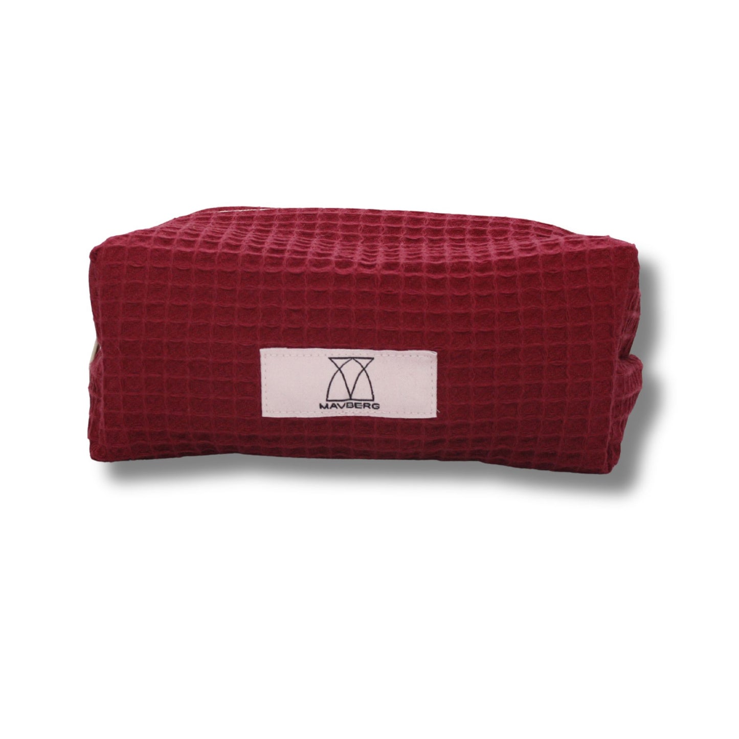 Beautybag/Kosmetiktaschein einem beerigen Rot Ton aus Waffelpique-Stoff, leicht texturiert, kompakt, viel Stauraum